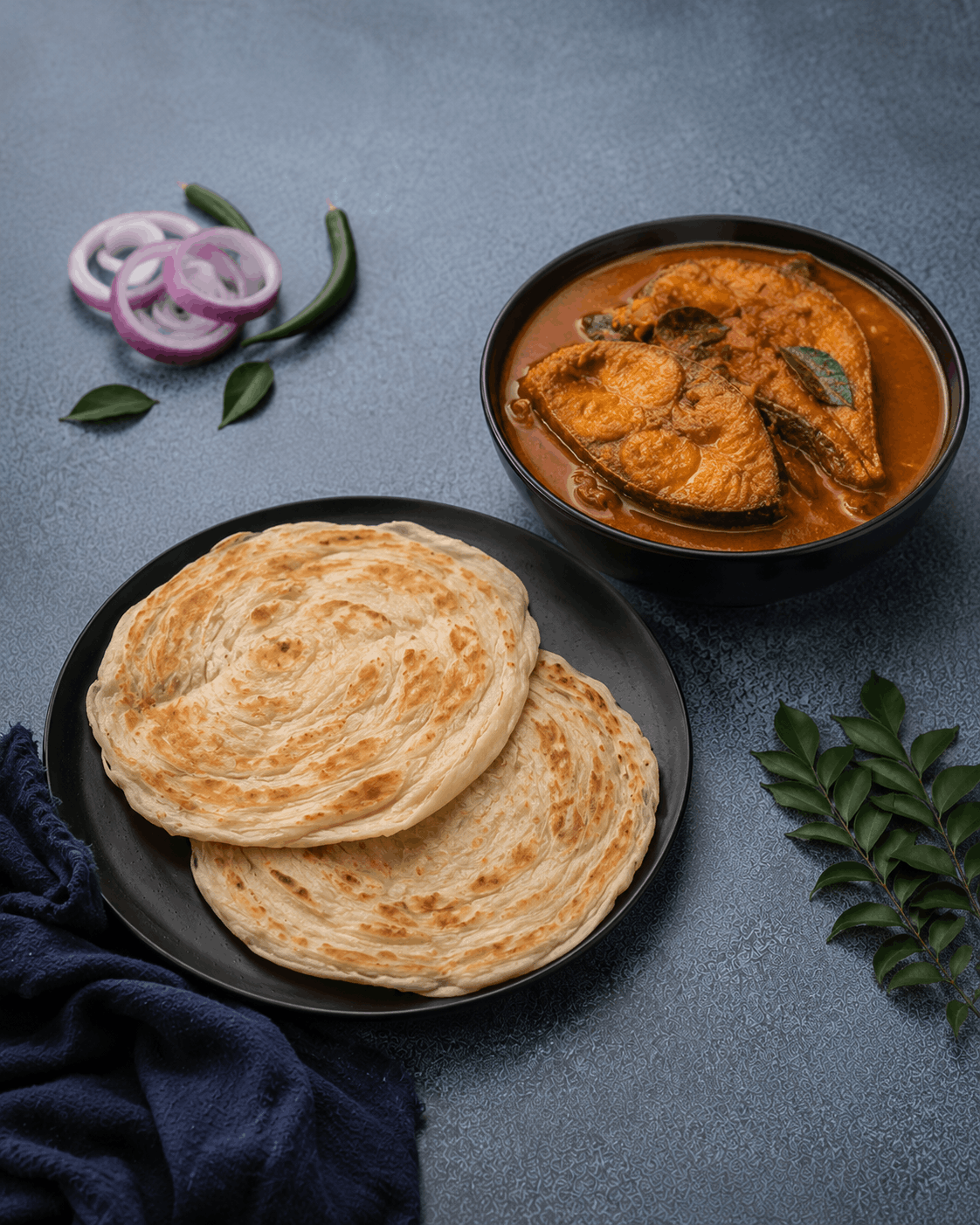 Parotta With Nellore Fish Pulusu